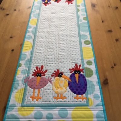 Colorful Coop Quilted Table Runner