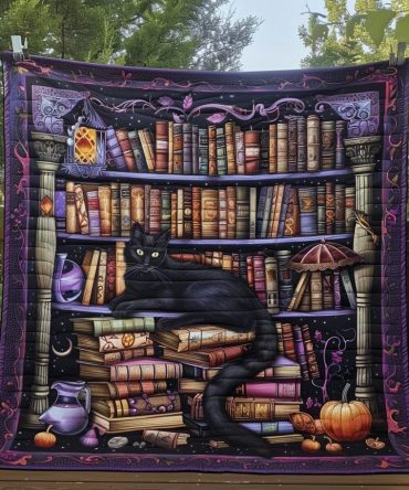 Cat Among Books Quilted Blanket