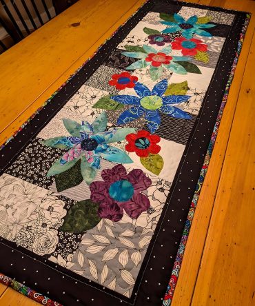 Blooming Spectrum Quilted Table Runner