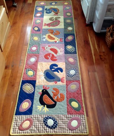 Playful Poultry Parade Quilted Table Runner